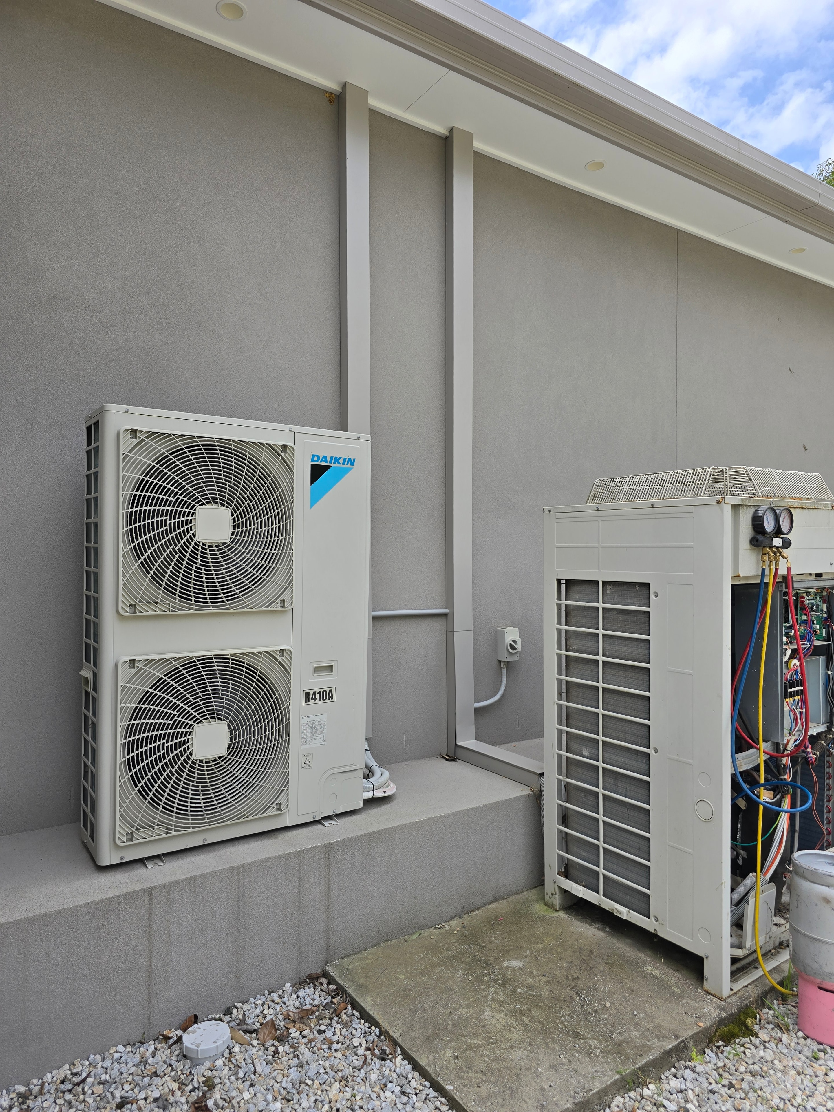 HVAC technician performing maintenance